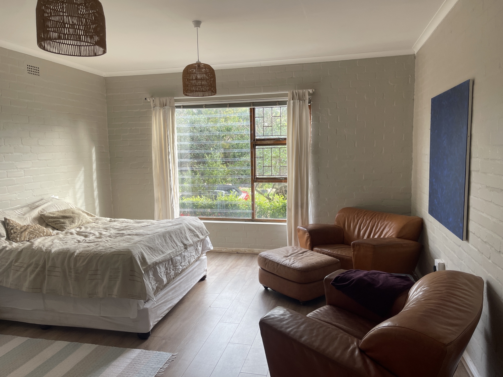 Cosy up in the leather chairs with a glass of wine from the local vineyard.