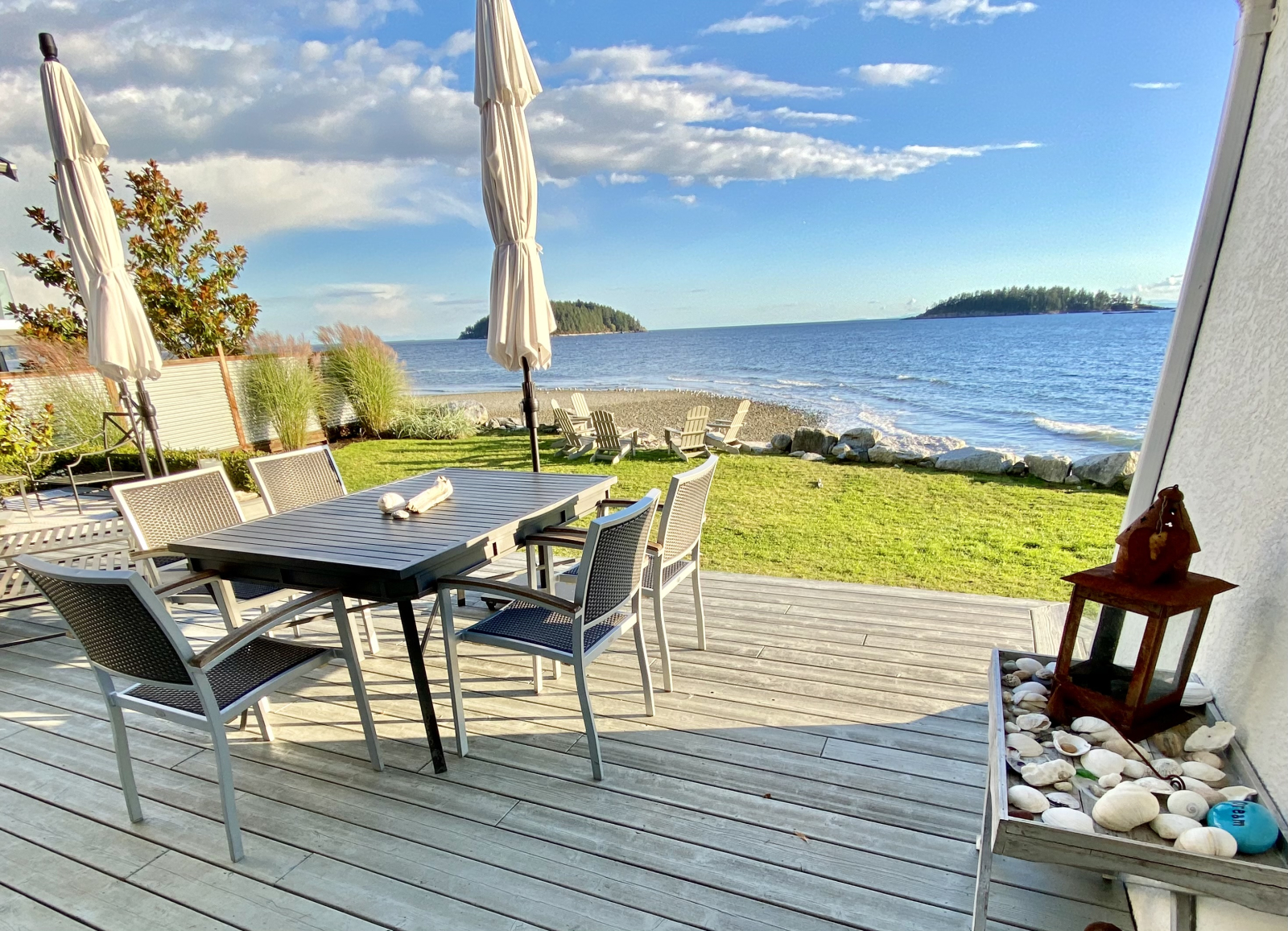 46 sq. metre (500 sq. ft.) deck for outdoor dining (shown here), lounging and covered seating.