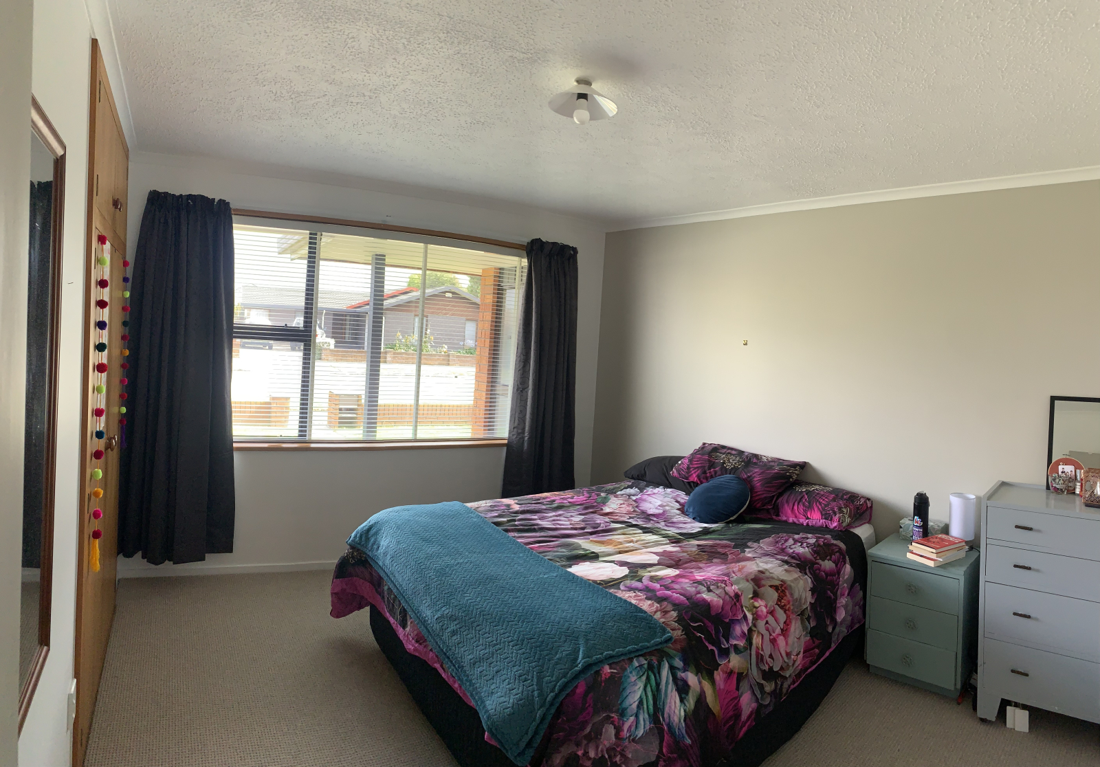 Bedroom 1 with queen sized bed, large double wardrobe, chest of drawers and bedside table as well as ...