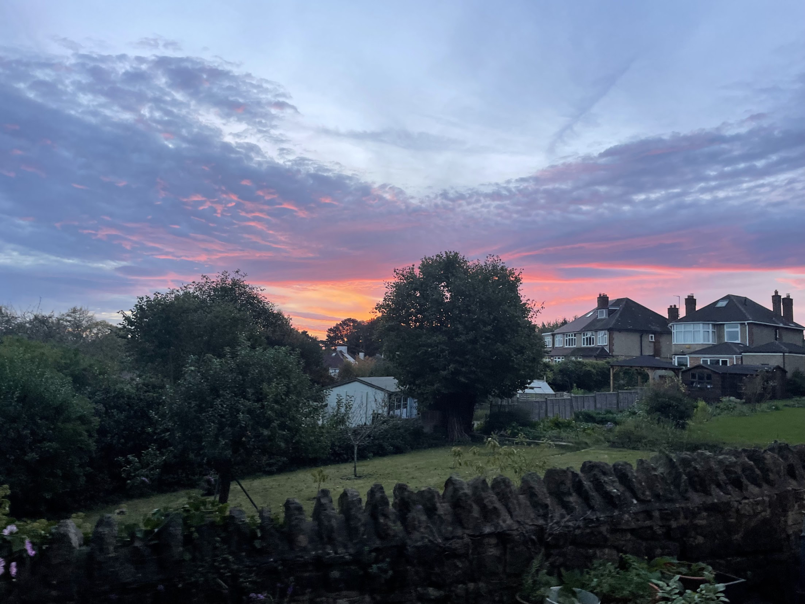 View from garden, historic stone walls