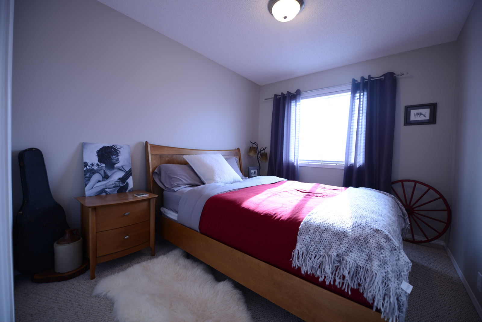 Second floor guest bedroom, queen size bed.