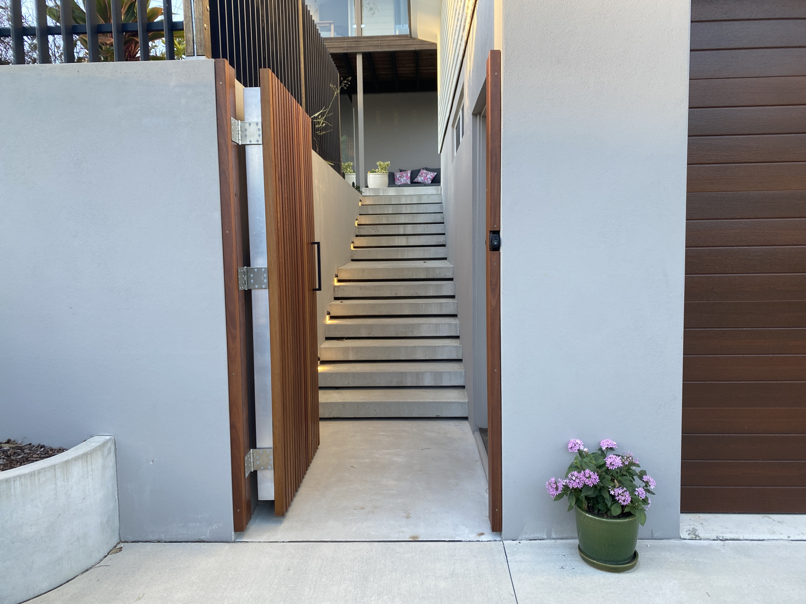 Stairs from driveway leading to first level of our home.
