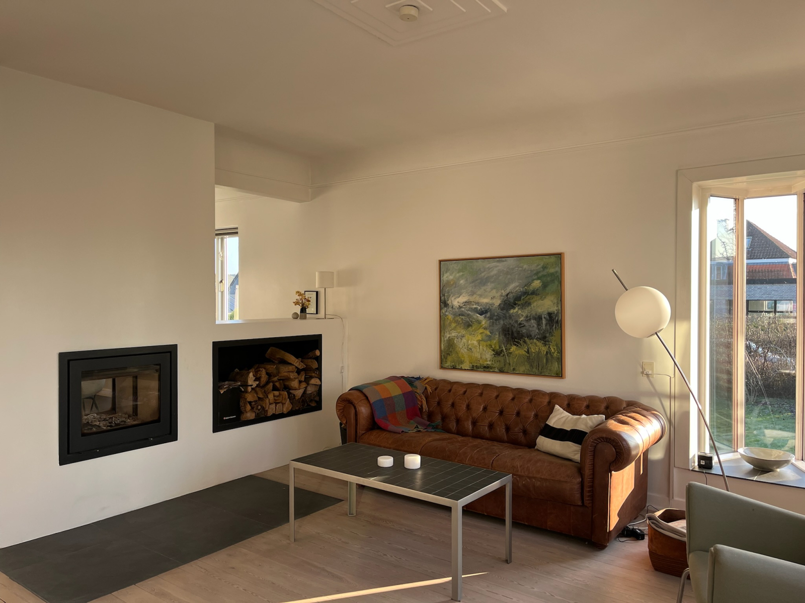 Living room 1 with fire place (closed wood burning stove).
