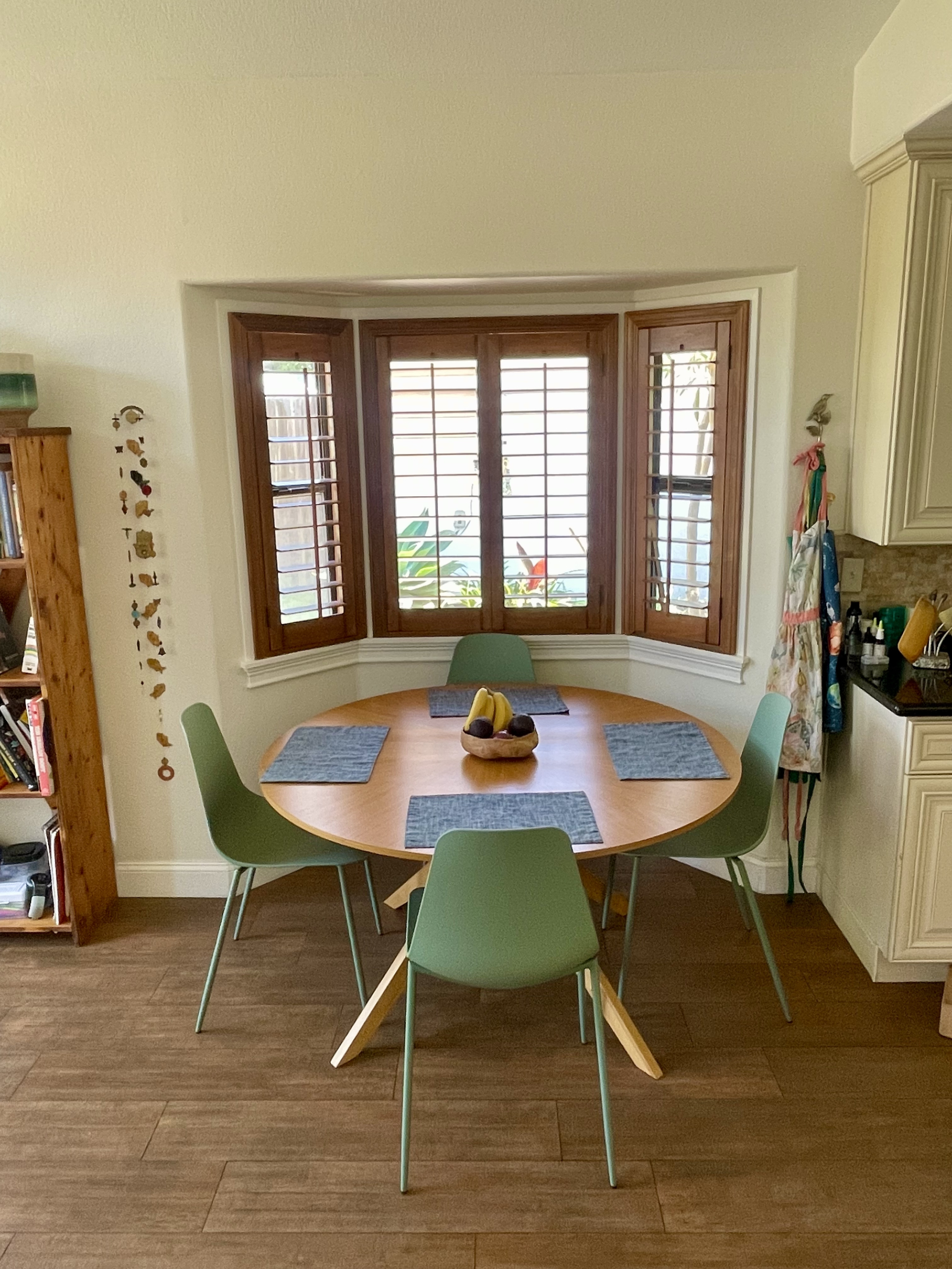 Kitchen seating for 4 with additional chairs in garage.