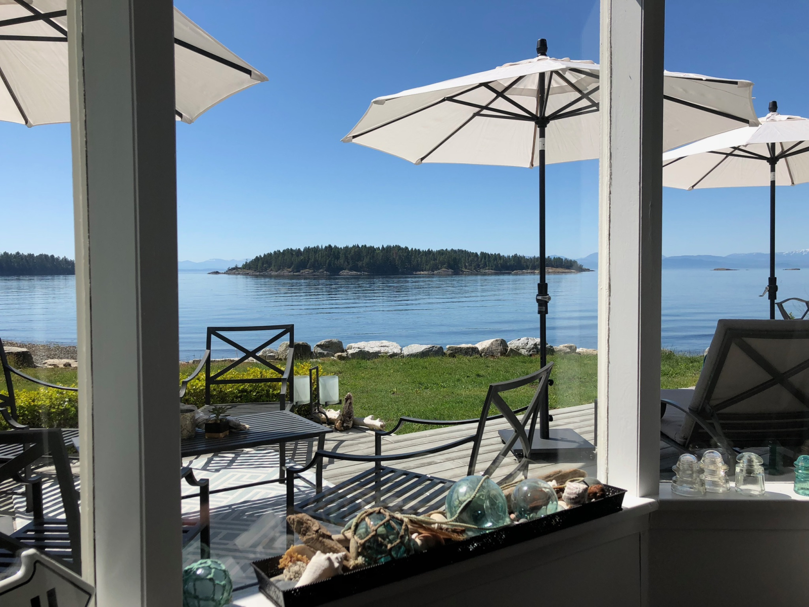 Catch sunrises and sunsets from the south-facing property with views of the Trail Islands and Vancou ...