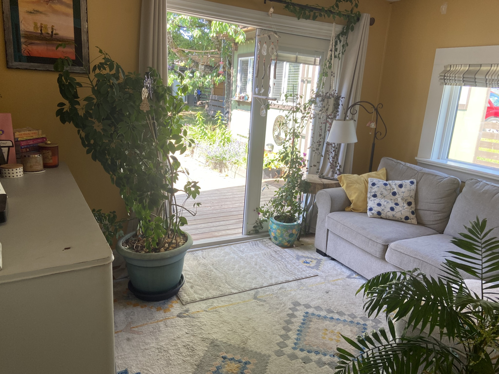 TV room with pull out sofa bed and French doors to back patio