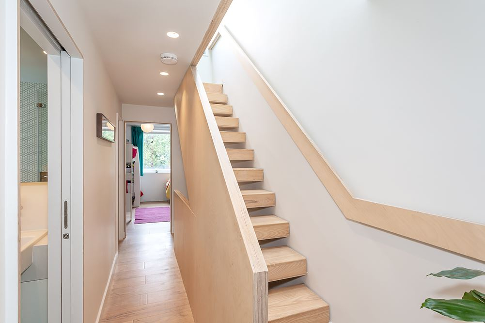 First floor stairs leading up to main bedroom