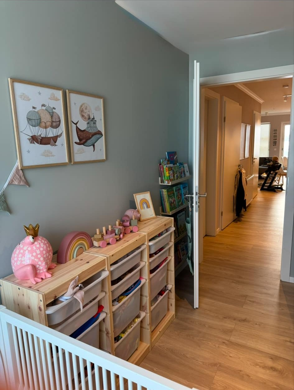 The childrens room overlooking the hallway and the living room