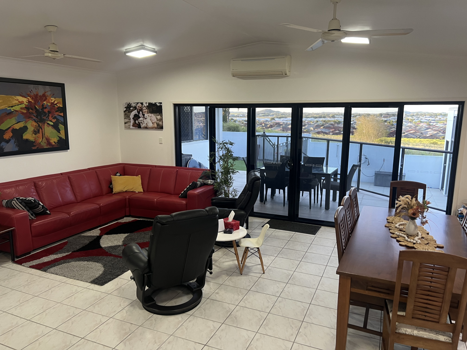 Family room leading to patio, view and pool area