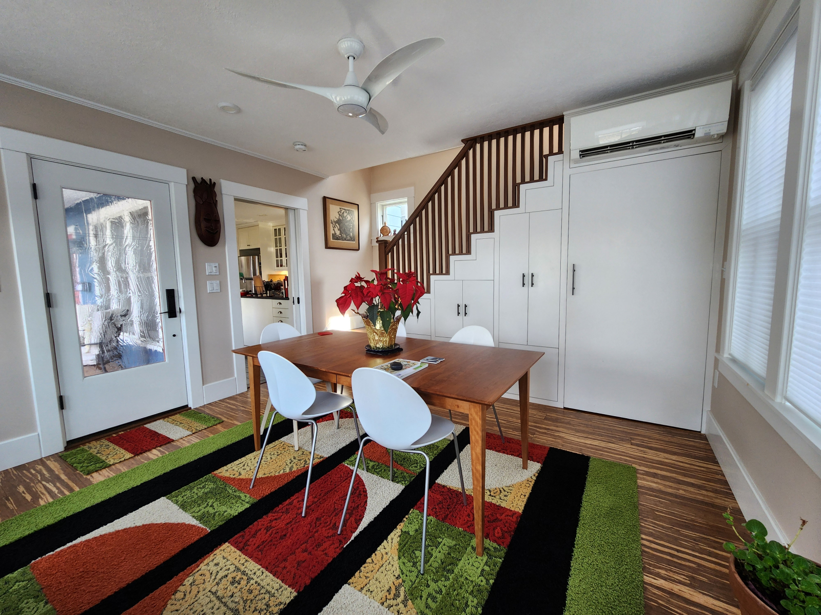 Dining room and laundry. The table  expands. The laundry is under the staircase.
