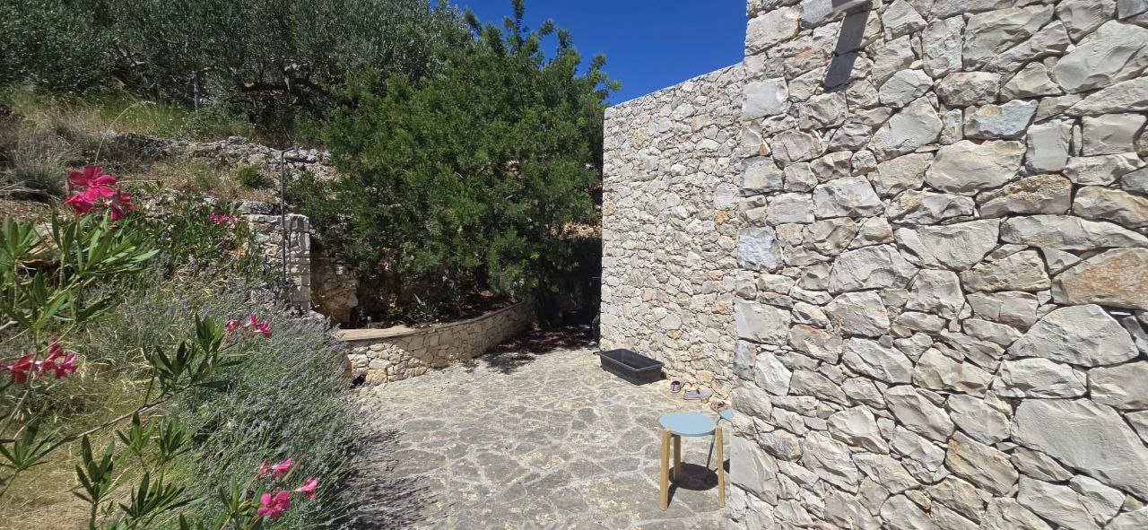 The entrance to our house is right around the corner.