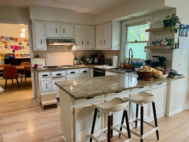 Airy kitchen with double oven (not pictured). We are foodies and love to cook so have what you need! ...