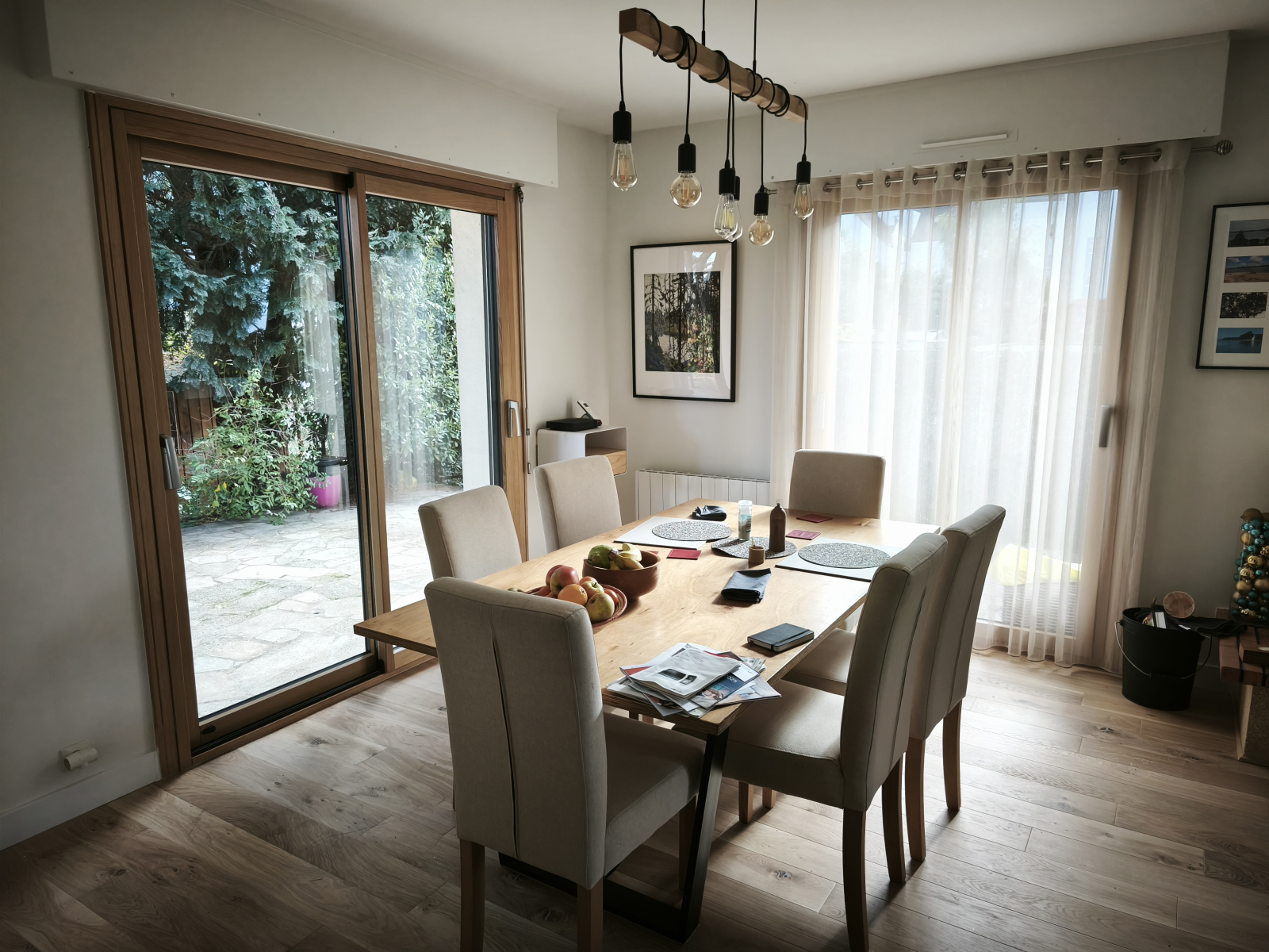 Dining area and South facing window (with curtain).