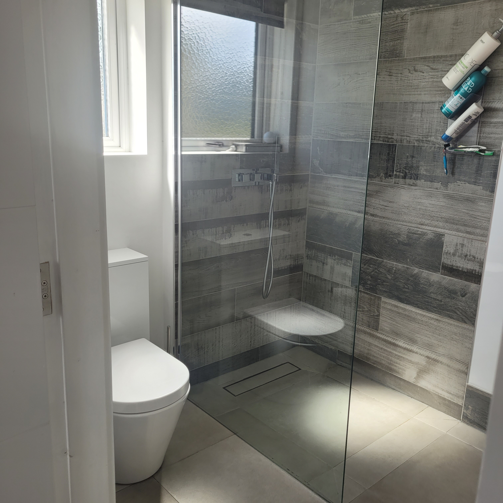 Main ensuite downstairs with double his and hers sinks