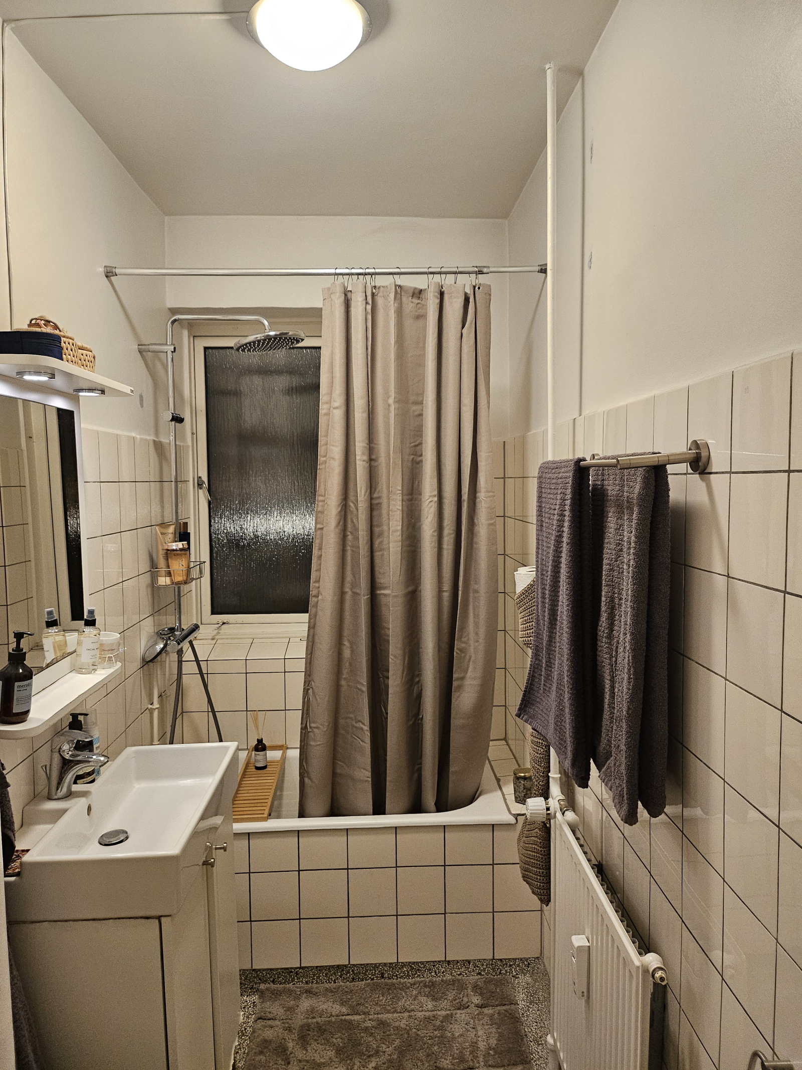 Bathroom with small bathtub