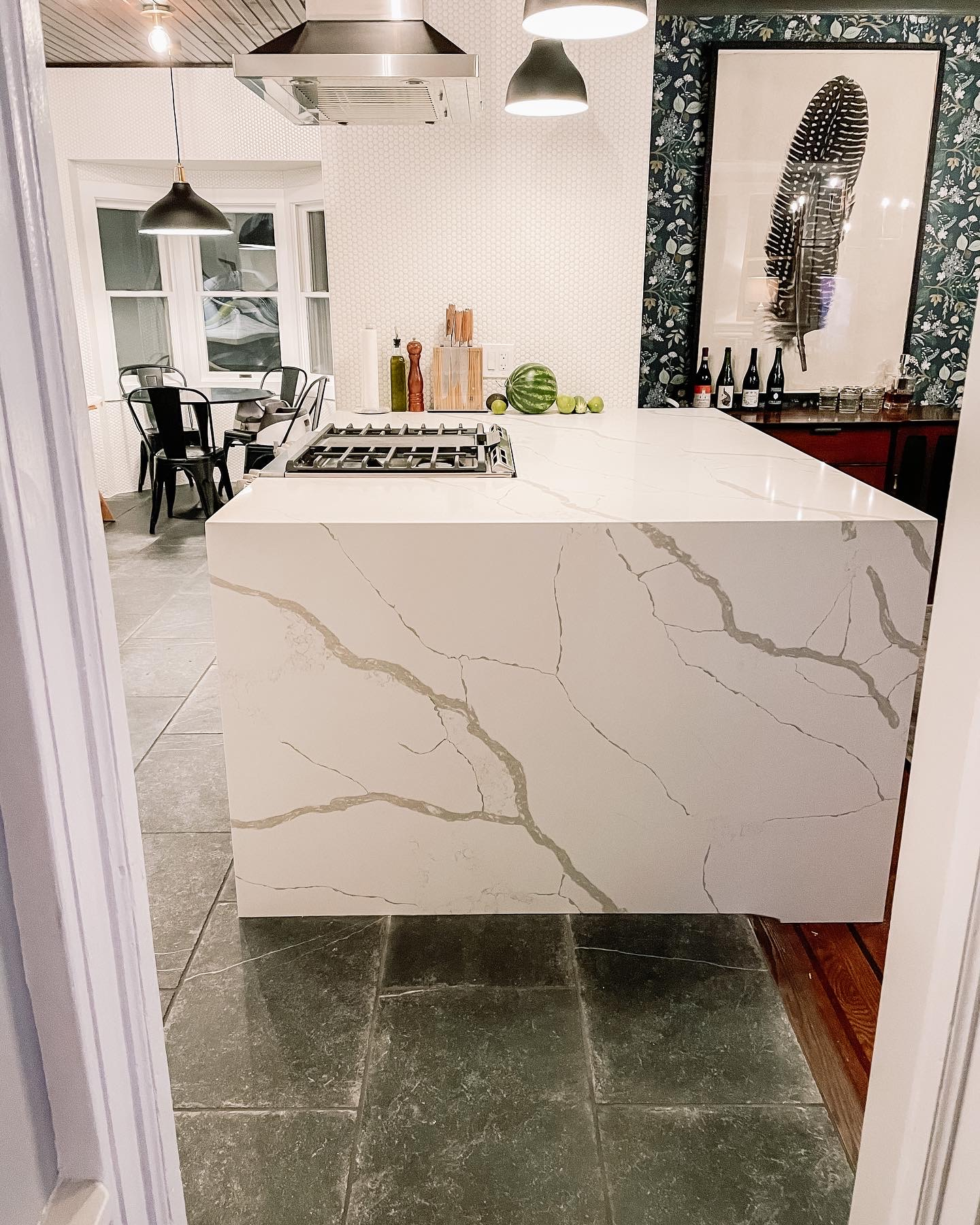 Island between kitchen and dining room