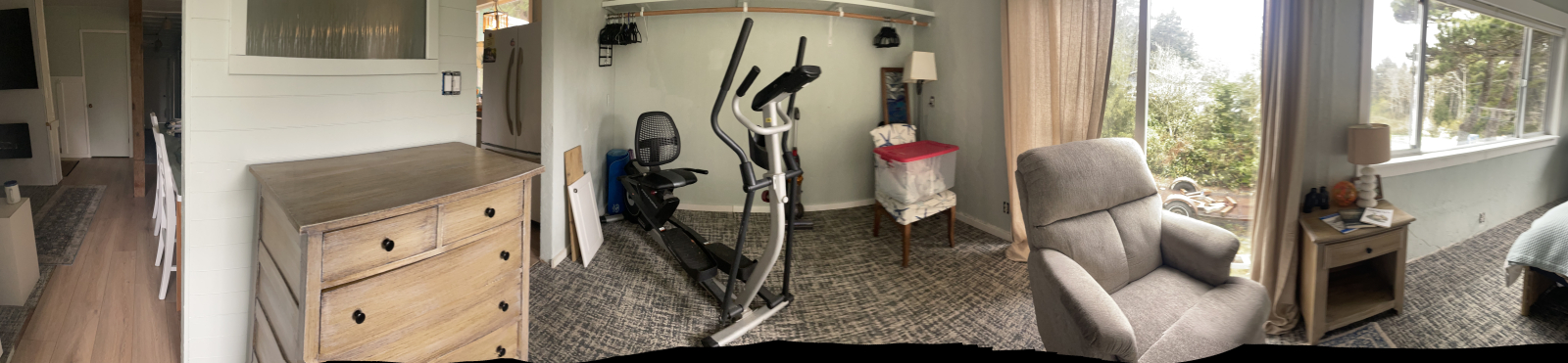 Pano of guest bed with King bed and ocean view