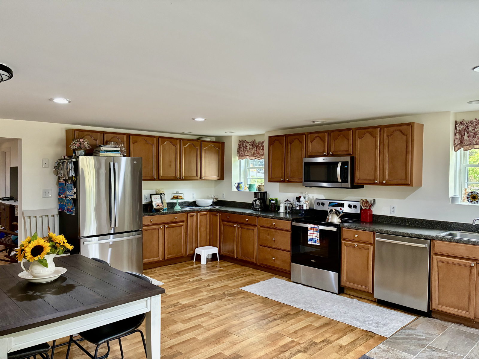 Full kitchen with refrigerator, stove, microwave, and dishwasher.  Lots of counter space.  Small app ...