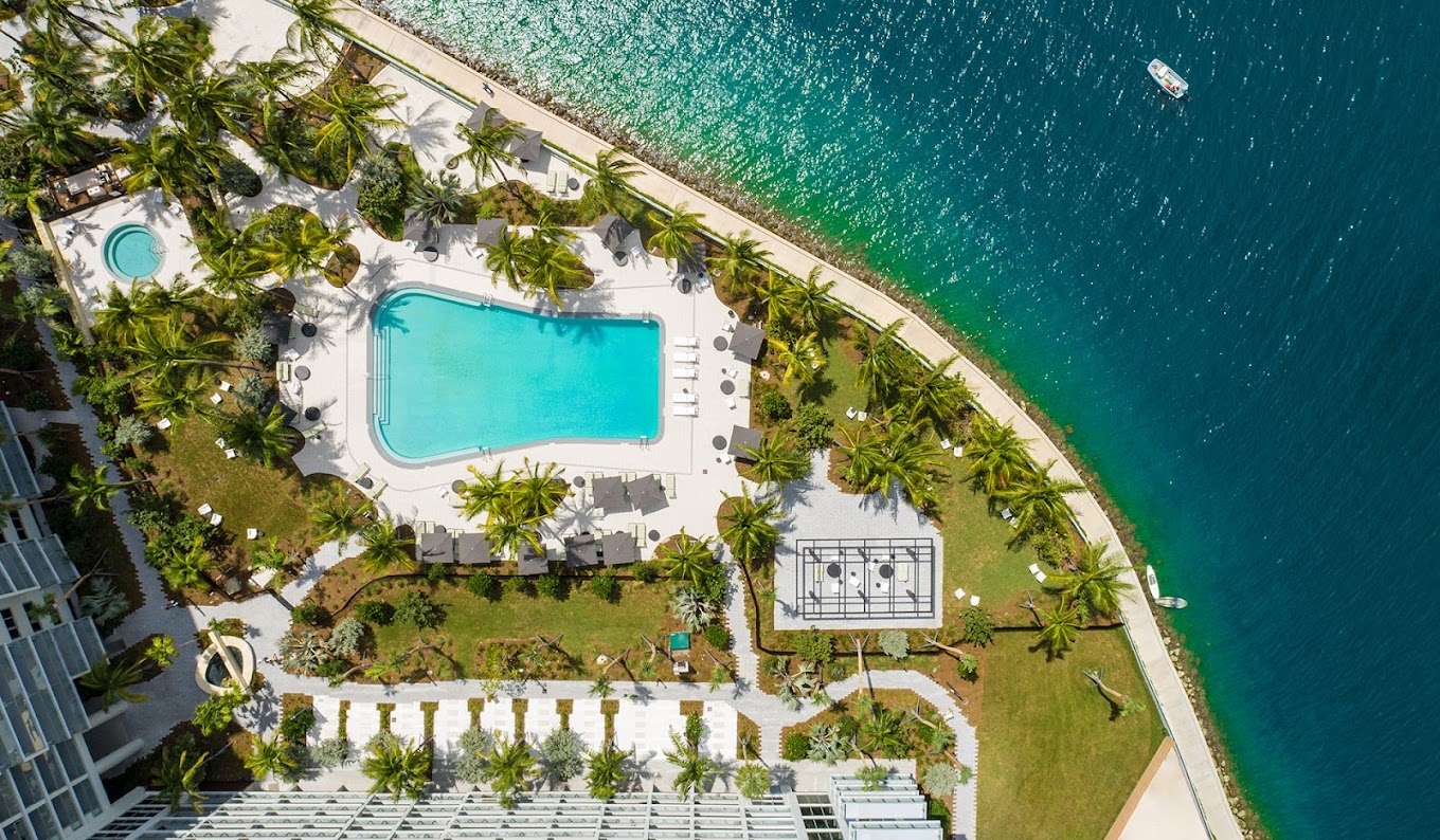 Sunny Artist’s Home in South Beach · Sunrise Balcony & Waterfront Pools