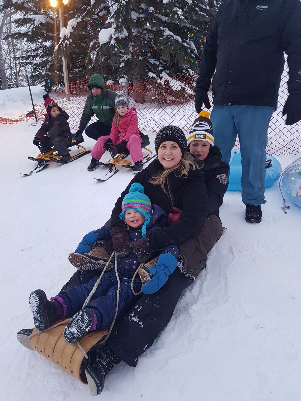 Tobogganing at our community lake