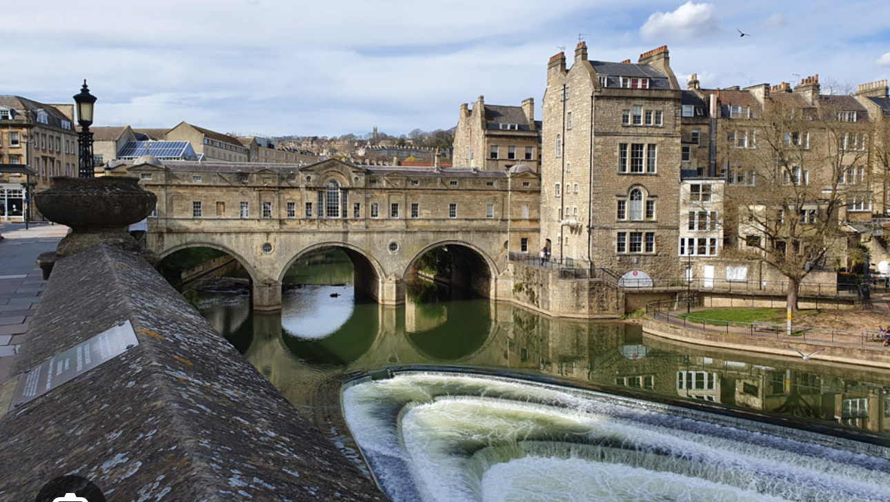 Pulteney Bridge is one of the most photographed examples of Georgian architecture in the city . Desi ...