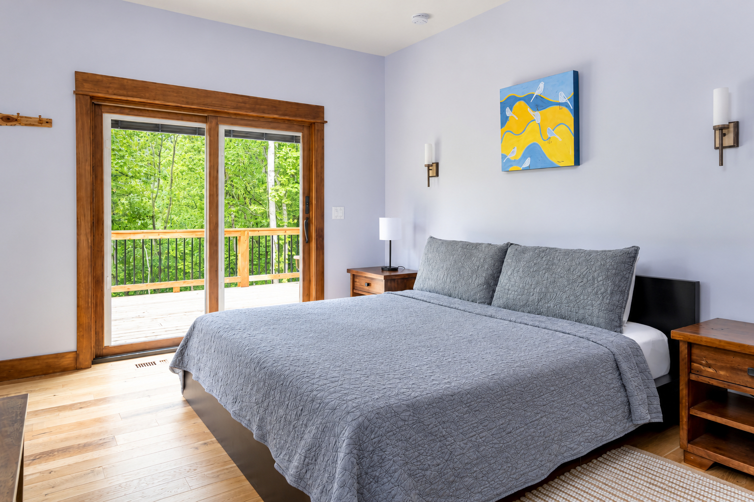Master bedroom on main floor with king bed, sliding glass door to deck and hot tub!