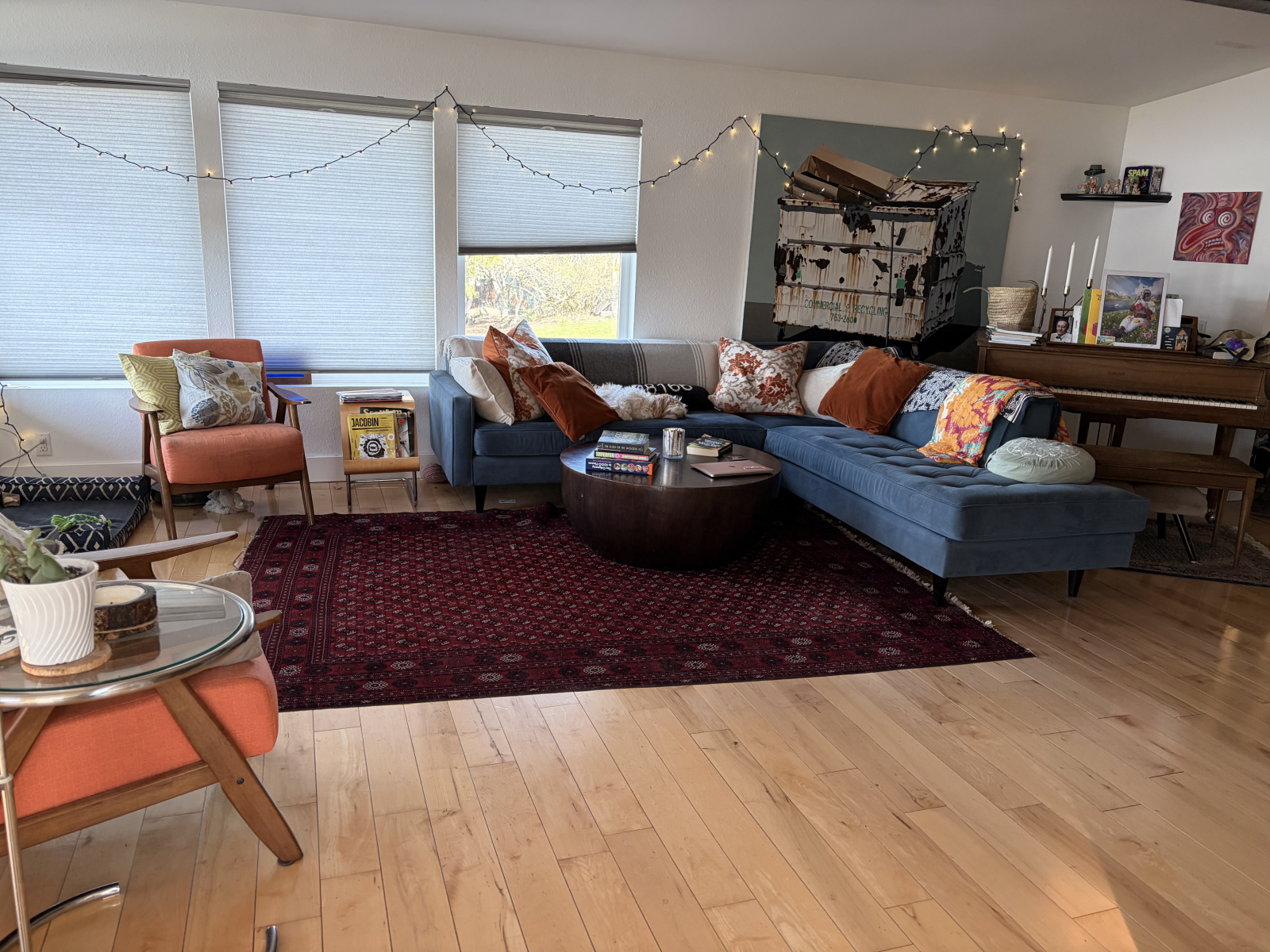 hardwood floors throughout the upstairs. Baby grand piano