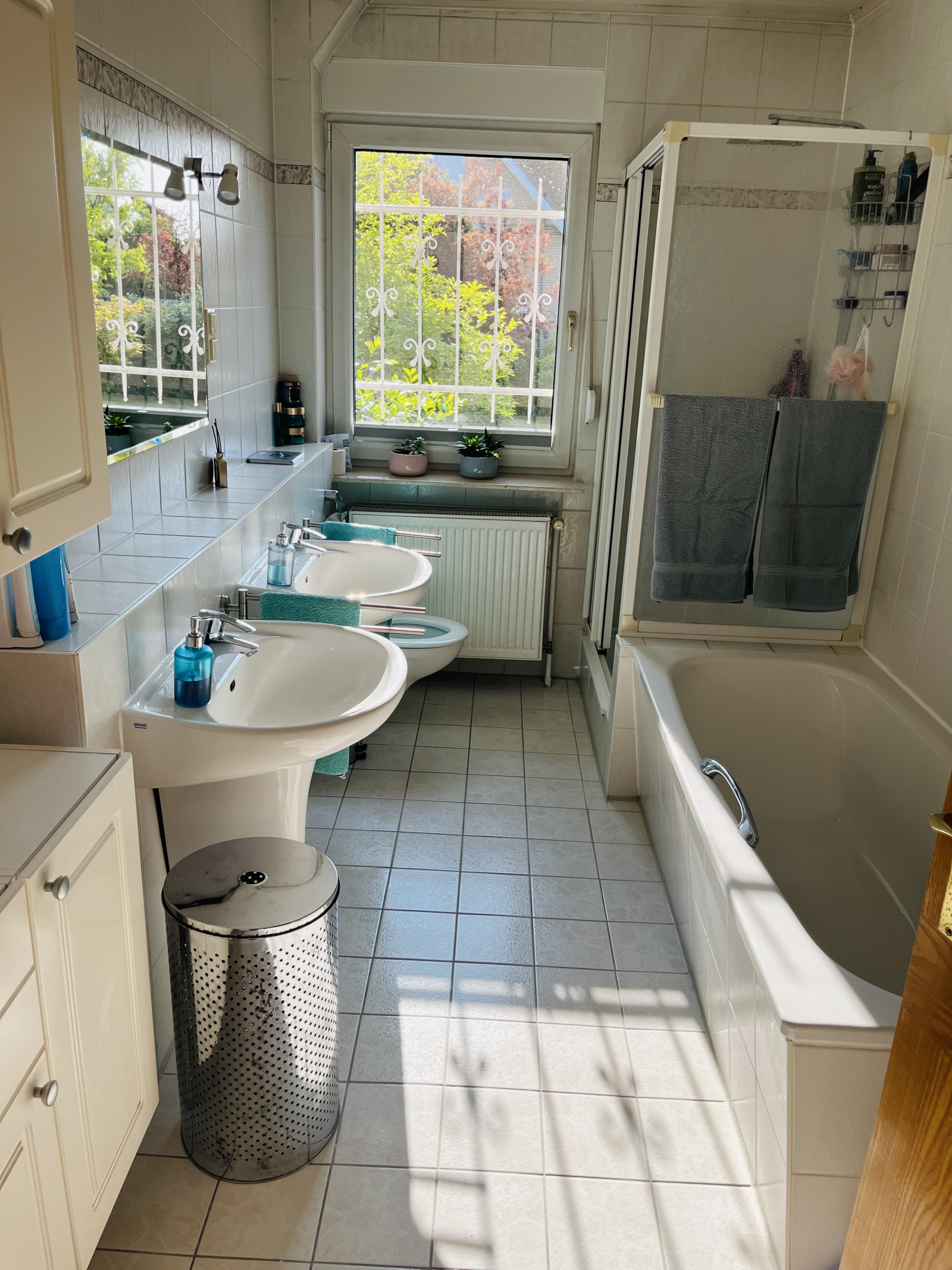 Bathroom with bath and shower.