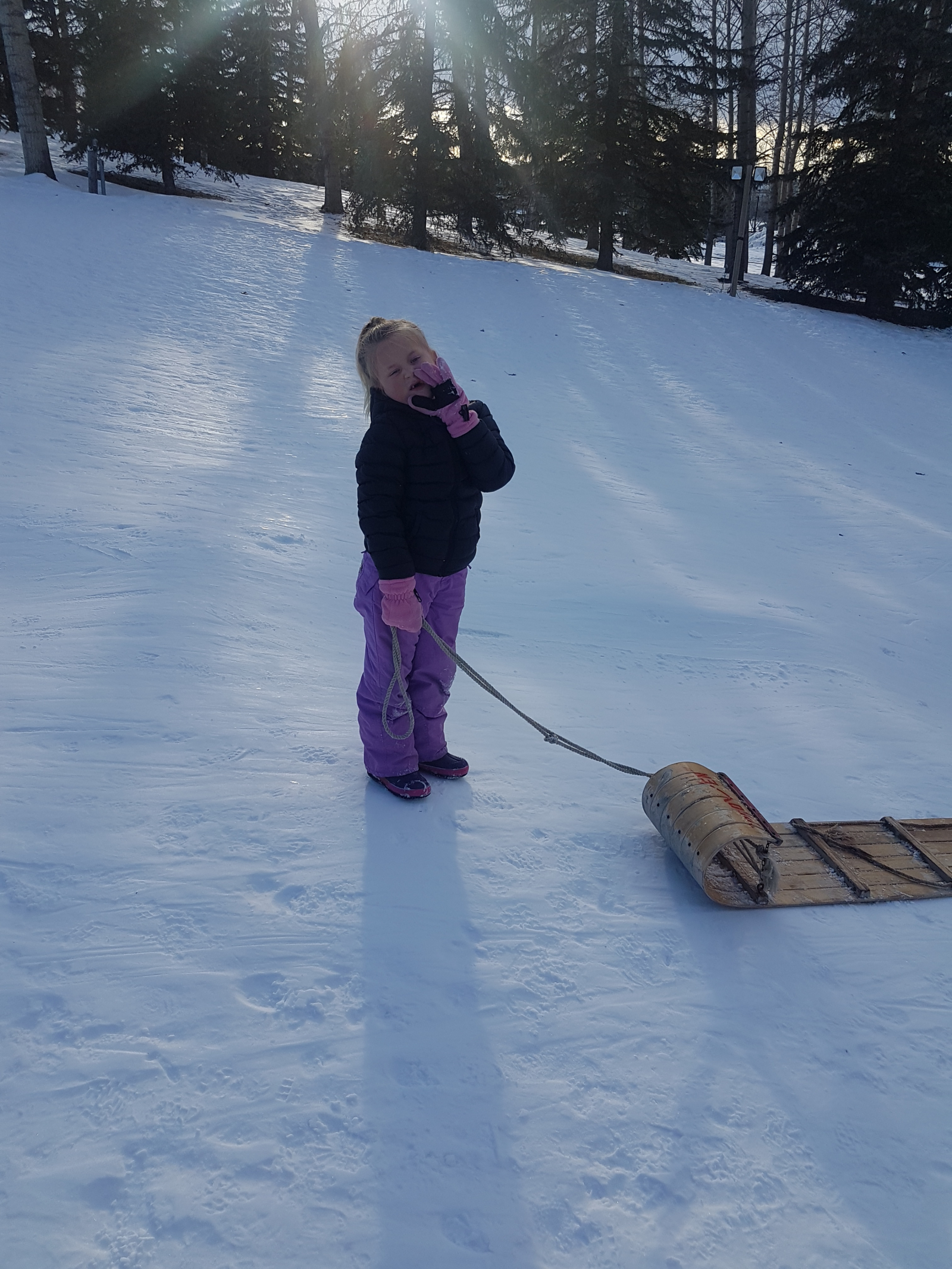Tobogganing at our community lake