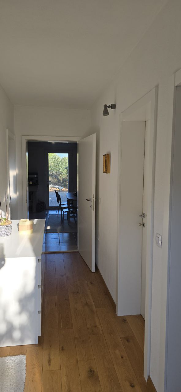 View from the entrance. On the left you will find the bathroom and toilet. On the right: entrance to ...