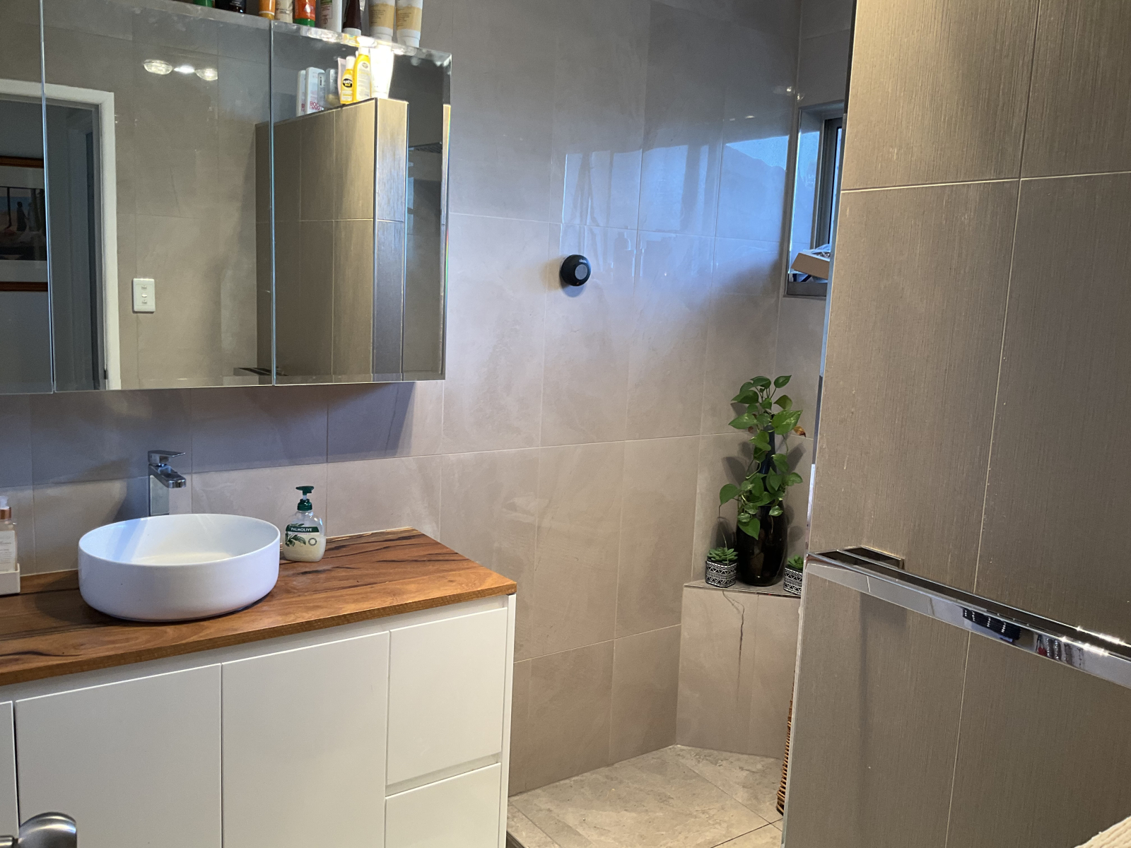 Vanity in bathroom. Toilet separate