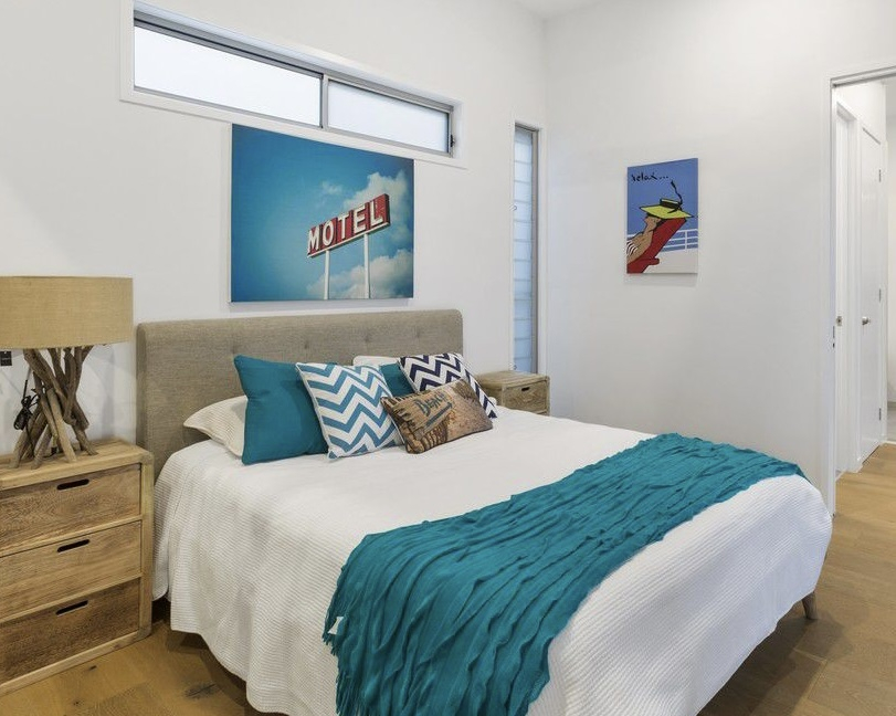 Bedroom 2 with access to three way bathroom.  Opens to central breezeway.