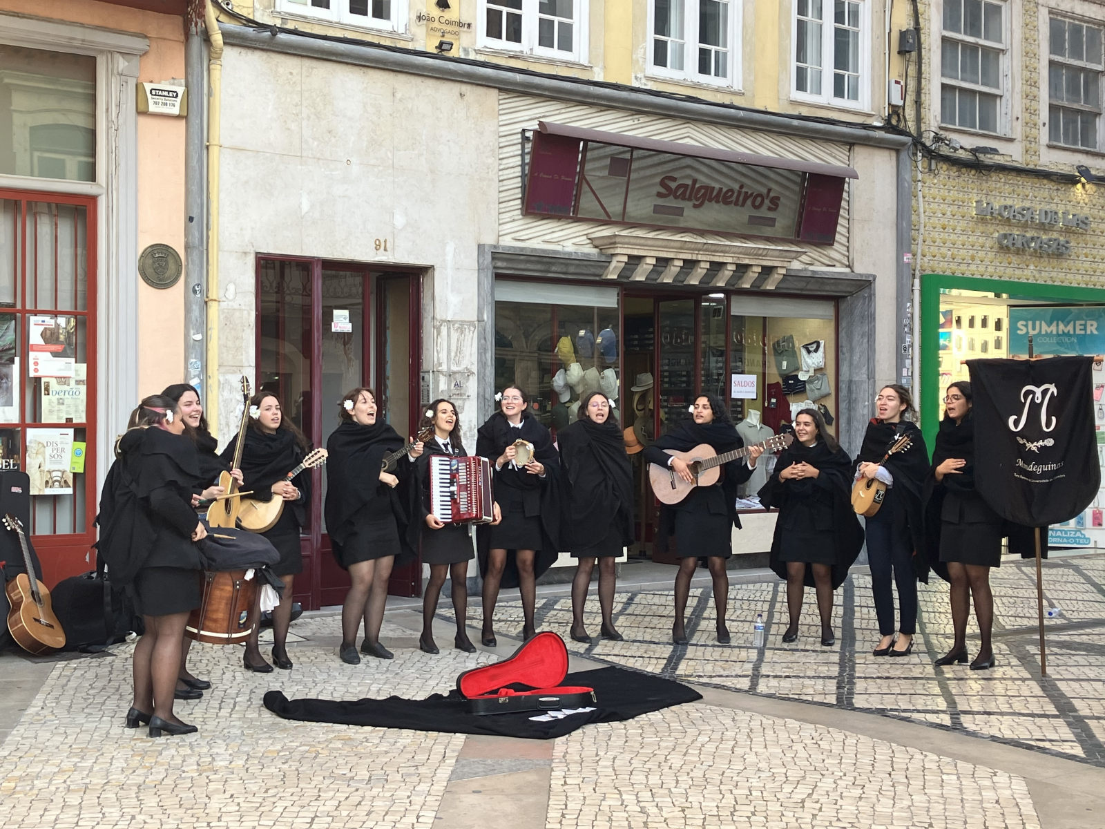 Students performing (often boys, but this time - a girl band!)