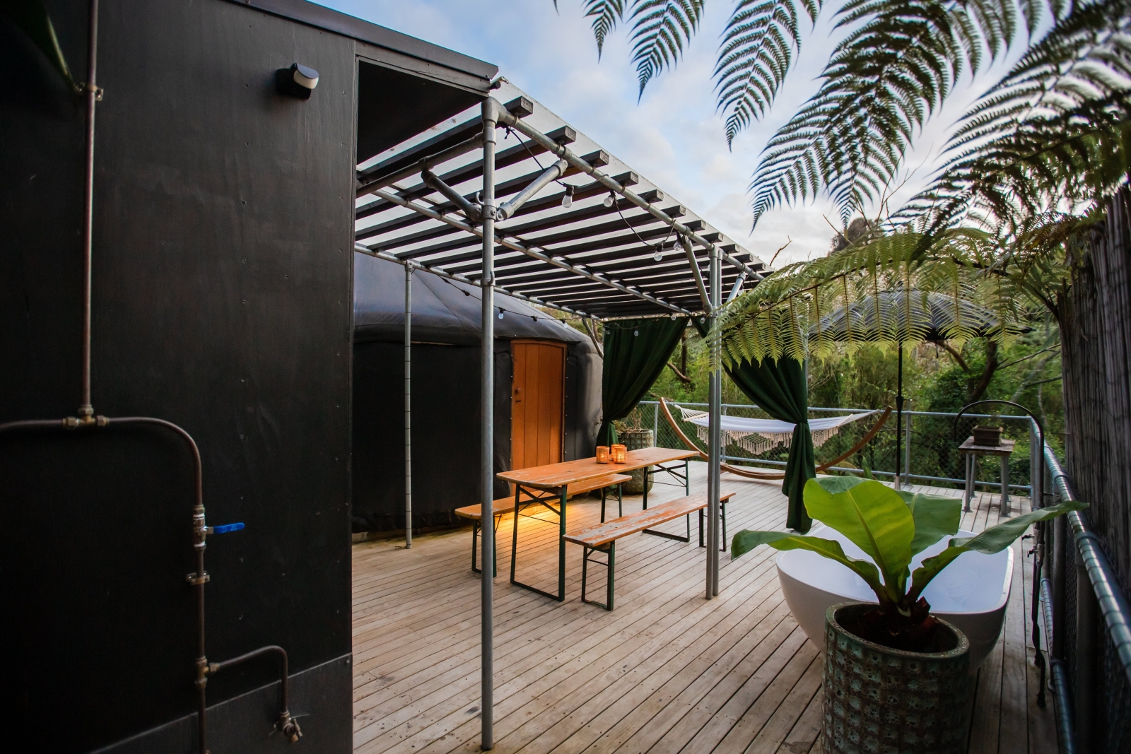 YURT surrounded by trees