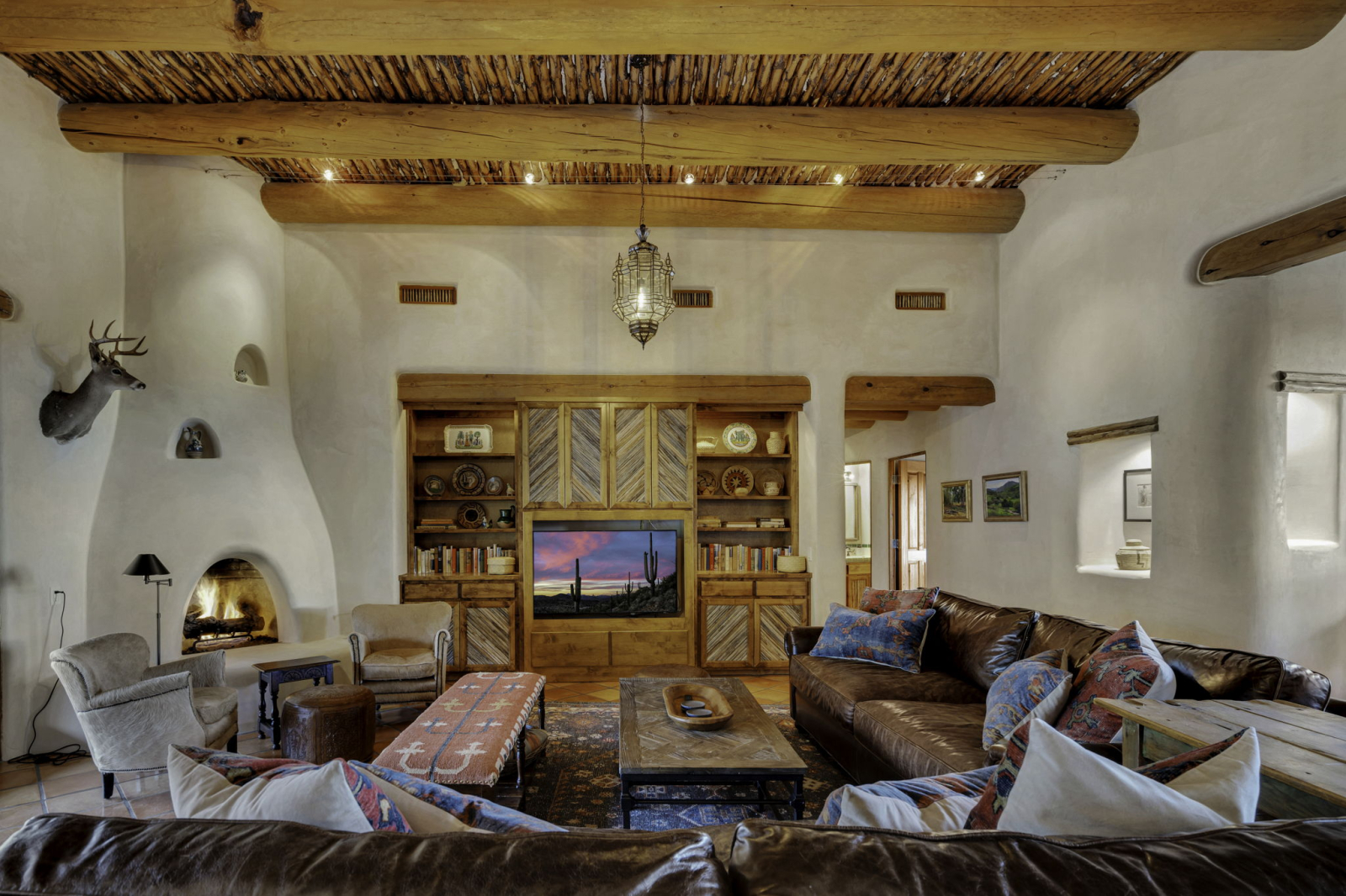 Great room with fireplace and media area