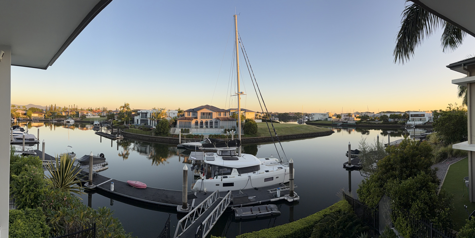 Modern waterfront home in a secure golfing estate.
