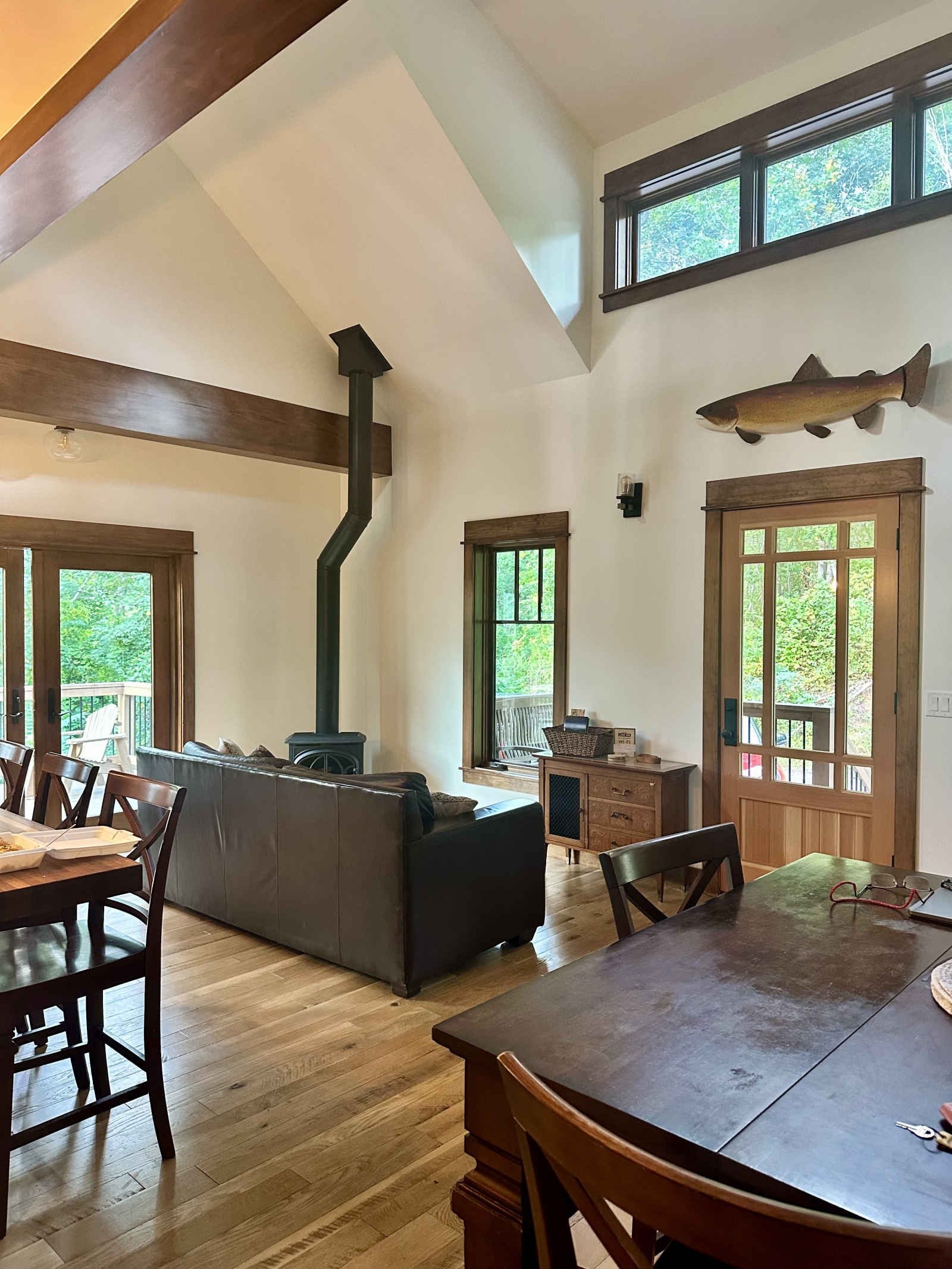 Living space on the main floor with a gas Jøtul stove for a cozy winter evening.