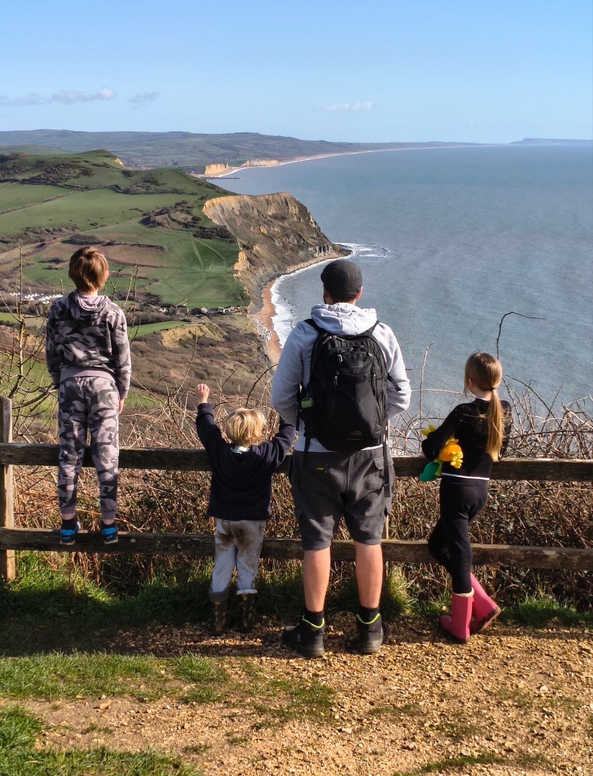 Family admiring the view from golden cap.