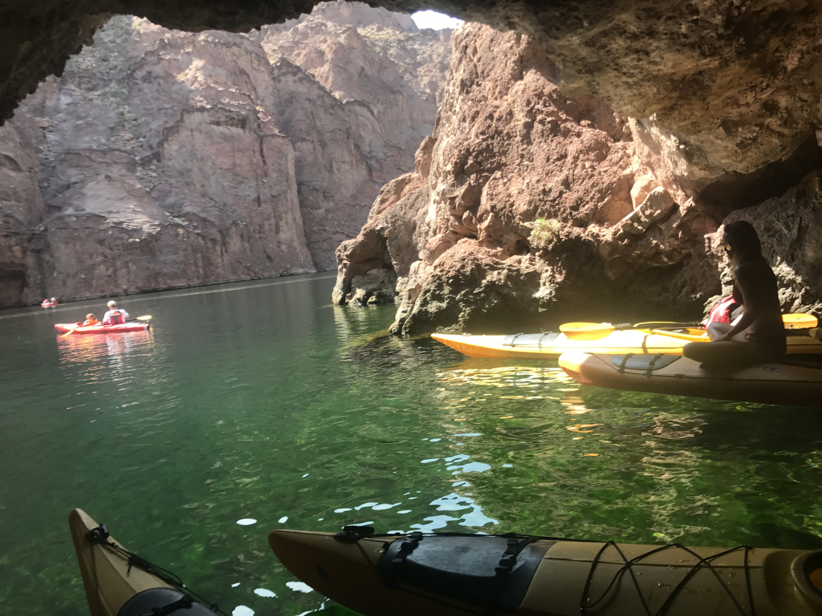 Kayak into Emerald Caves. This is a fun experience. As you paddle down between the mountains, you ca ...