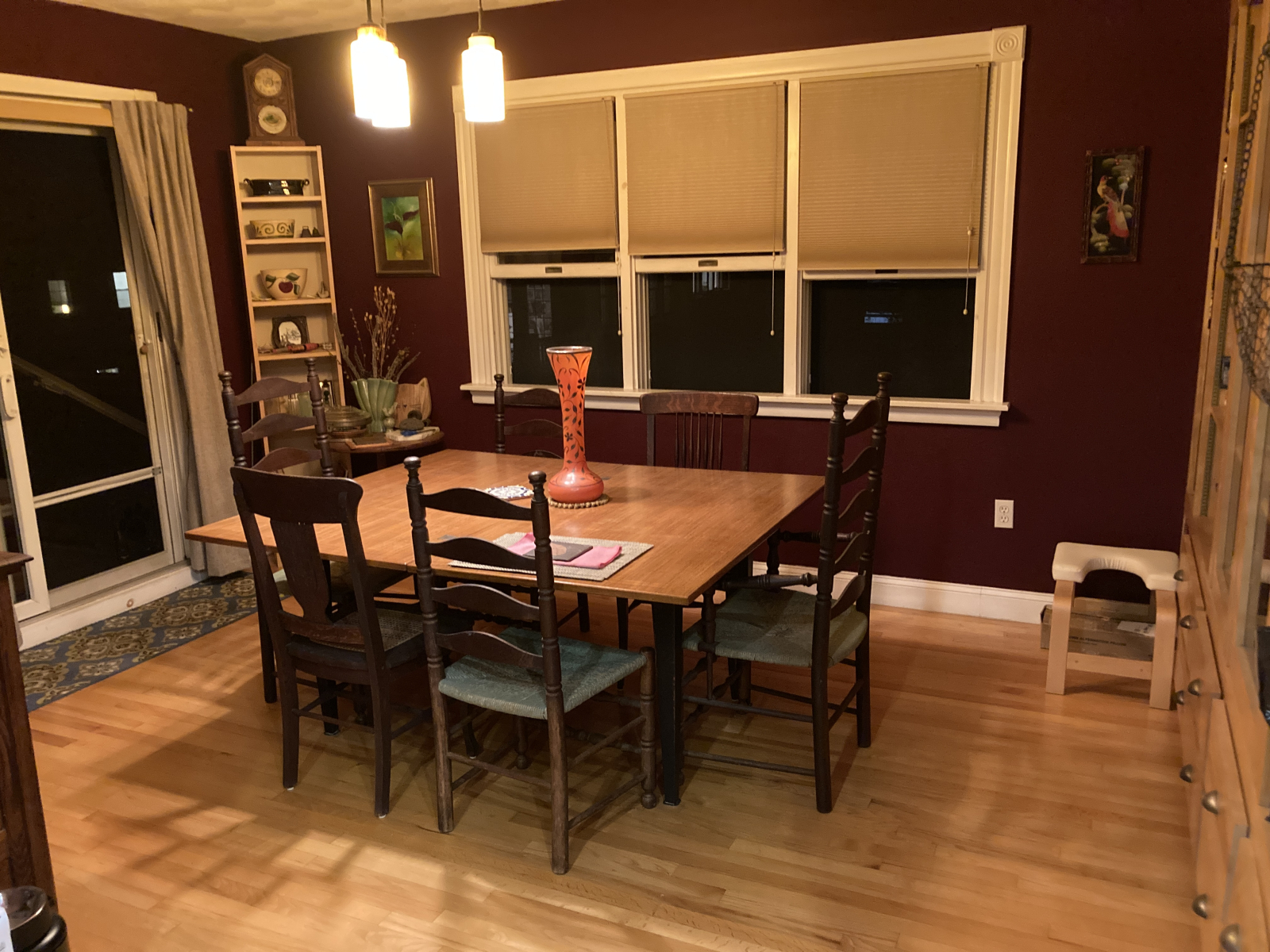 This is the dining room off the kitchen with a doorway to the back porch.