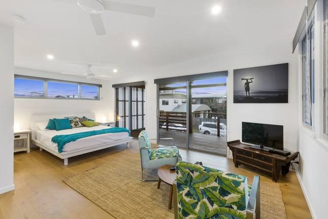 Self contained  studio on second level.  Ensuite and kitchenette.  Large front balcony with views to ...