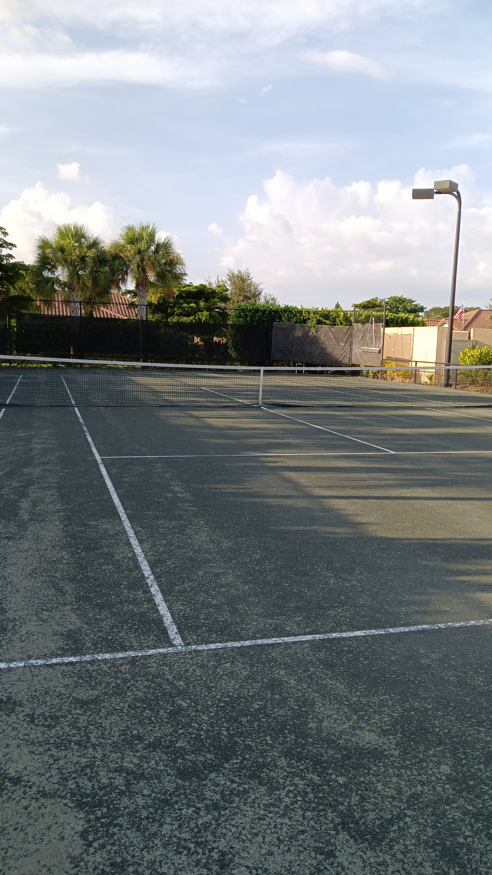 Clay tennis court at the Amenity Center