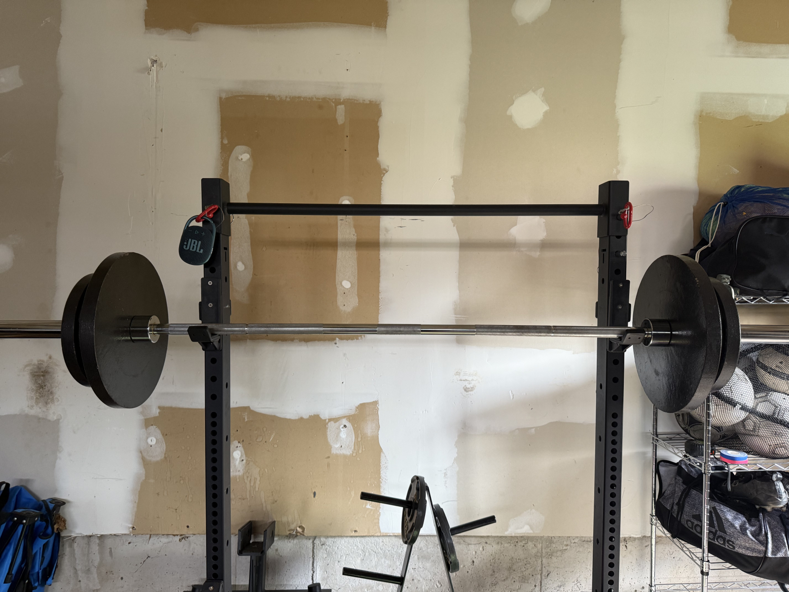 garage squat rack with adjustable weight bench.