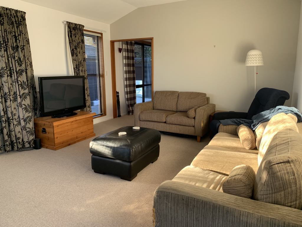 Sunny, light, comfy living room with plenty of seating and freeview TV with chromecast.