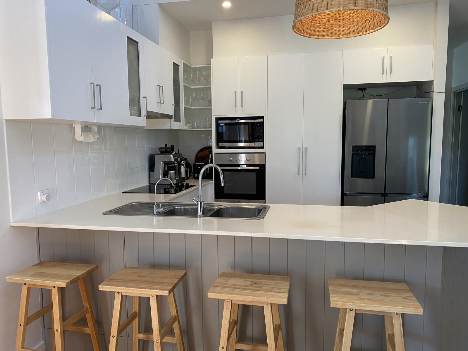 Kitchen on the upper floor with water filter and new fridge