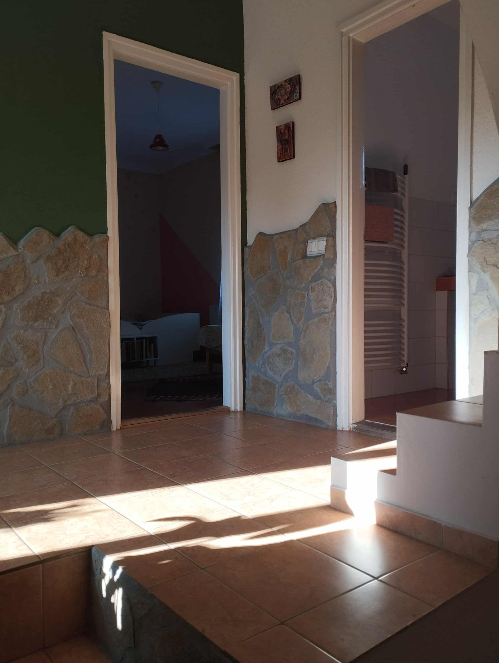 Second floor corridor with view to the bathroom and kids room