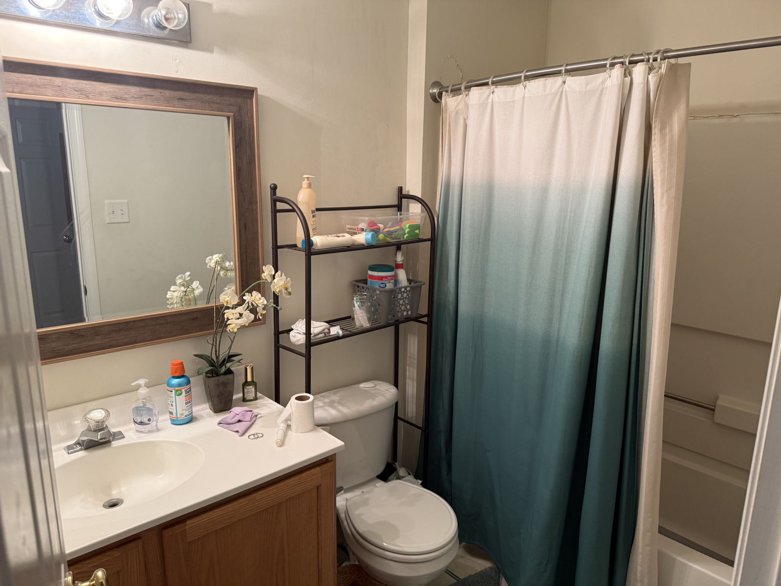 guest bathroom upstairs with shower/tub
