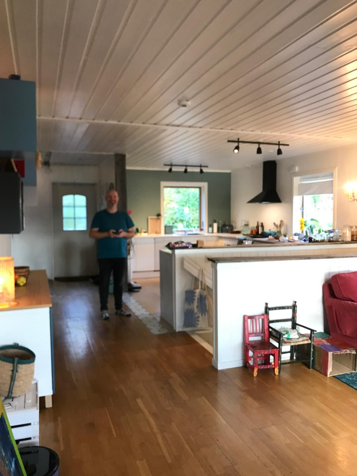 Kitchen, stairs and upstairs entrance, picture taken from the living room