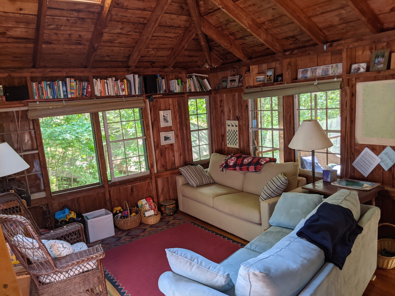 Family cabin at former sleepaway camp with docks, kayaks, and field