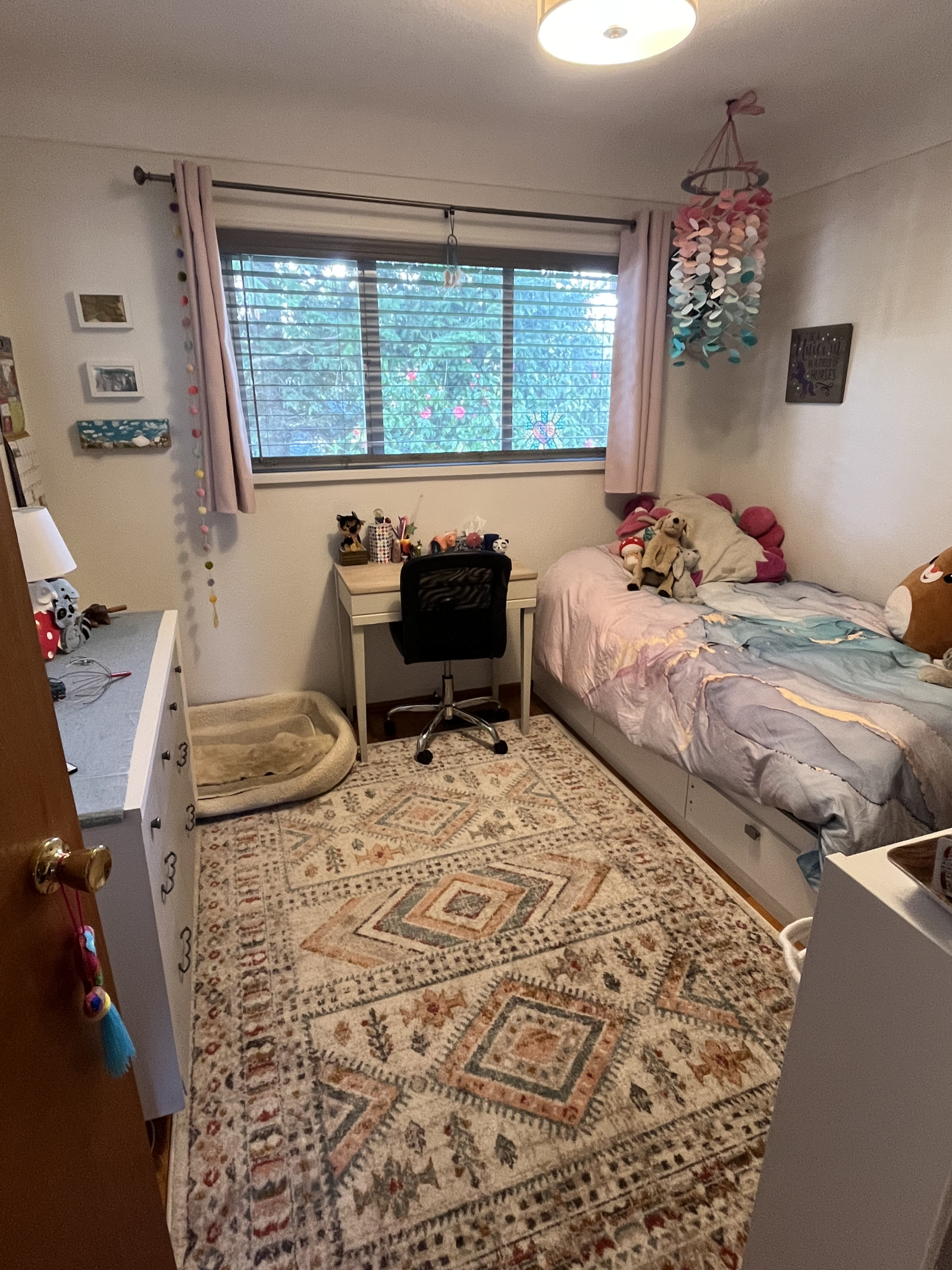 Upstairs kid's bedroom. Also has a dresser, and closet with toy racks. The bed has an extra mattress ...